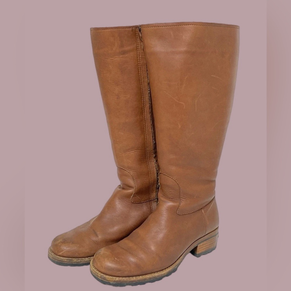 Ugg Women’s Shearling-Lined Leather Boots.